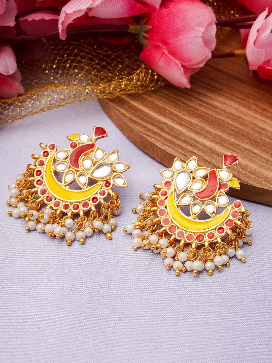 

Urmika Women Yellow & Red Peacock Shaped Chandbalis Earrings