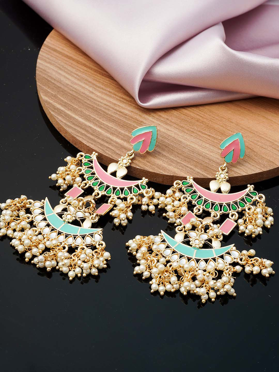 

Urmika Women Green & Red Teardrop Shaped Drop Earrings