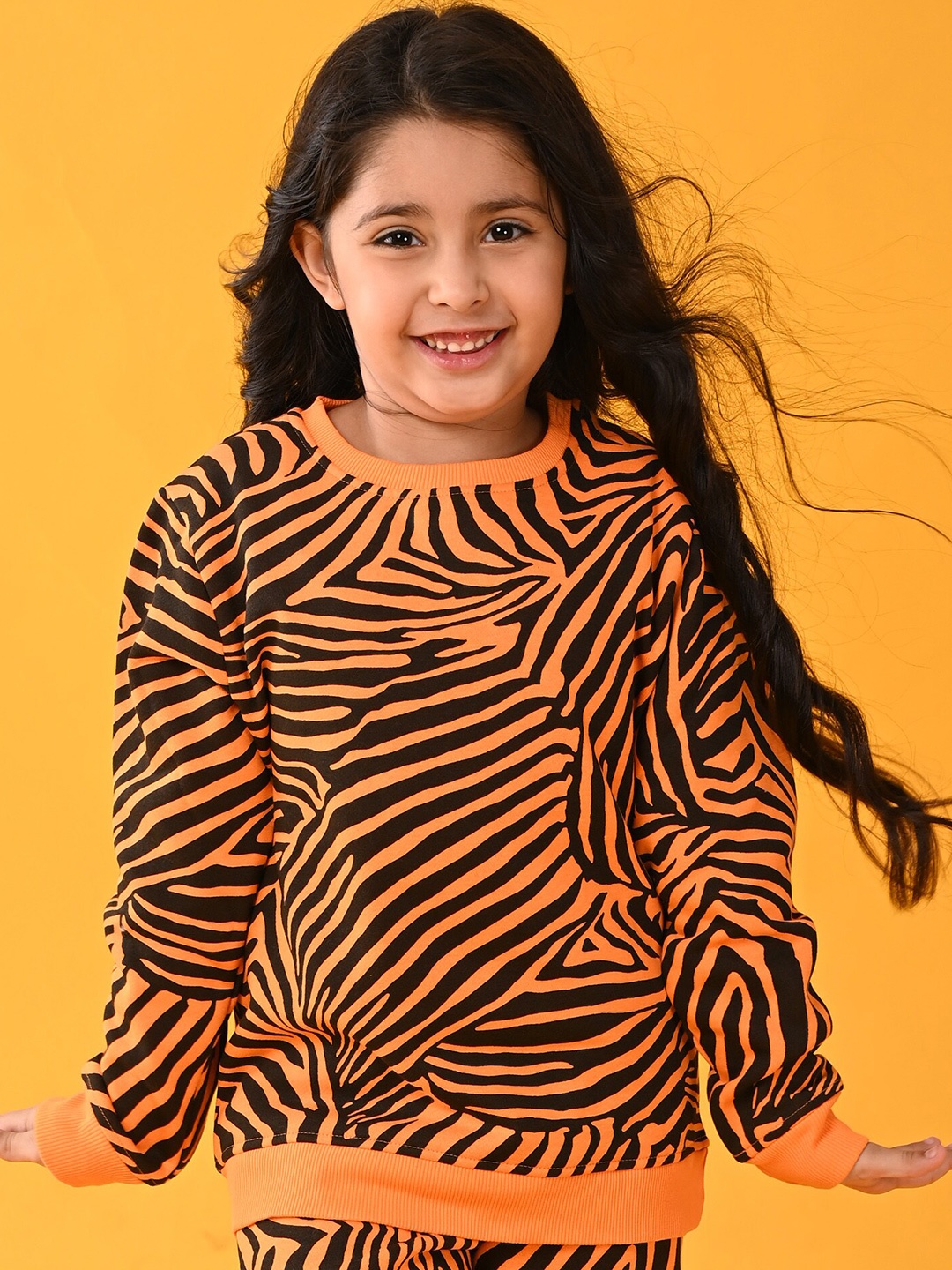 

Anthrilo Girls Orange Printed Sweatshirt