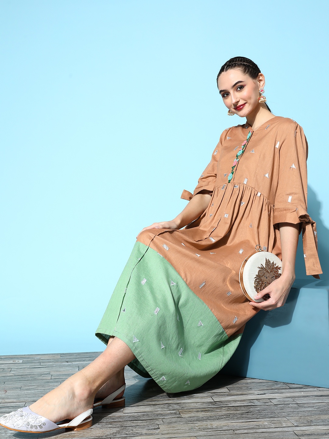 

Indo Era Women Beige Cotton Fluid Tie-Up Ethnic Dress