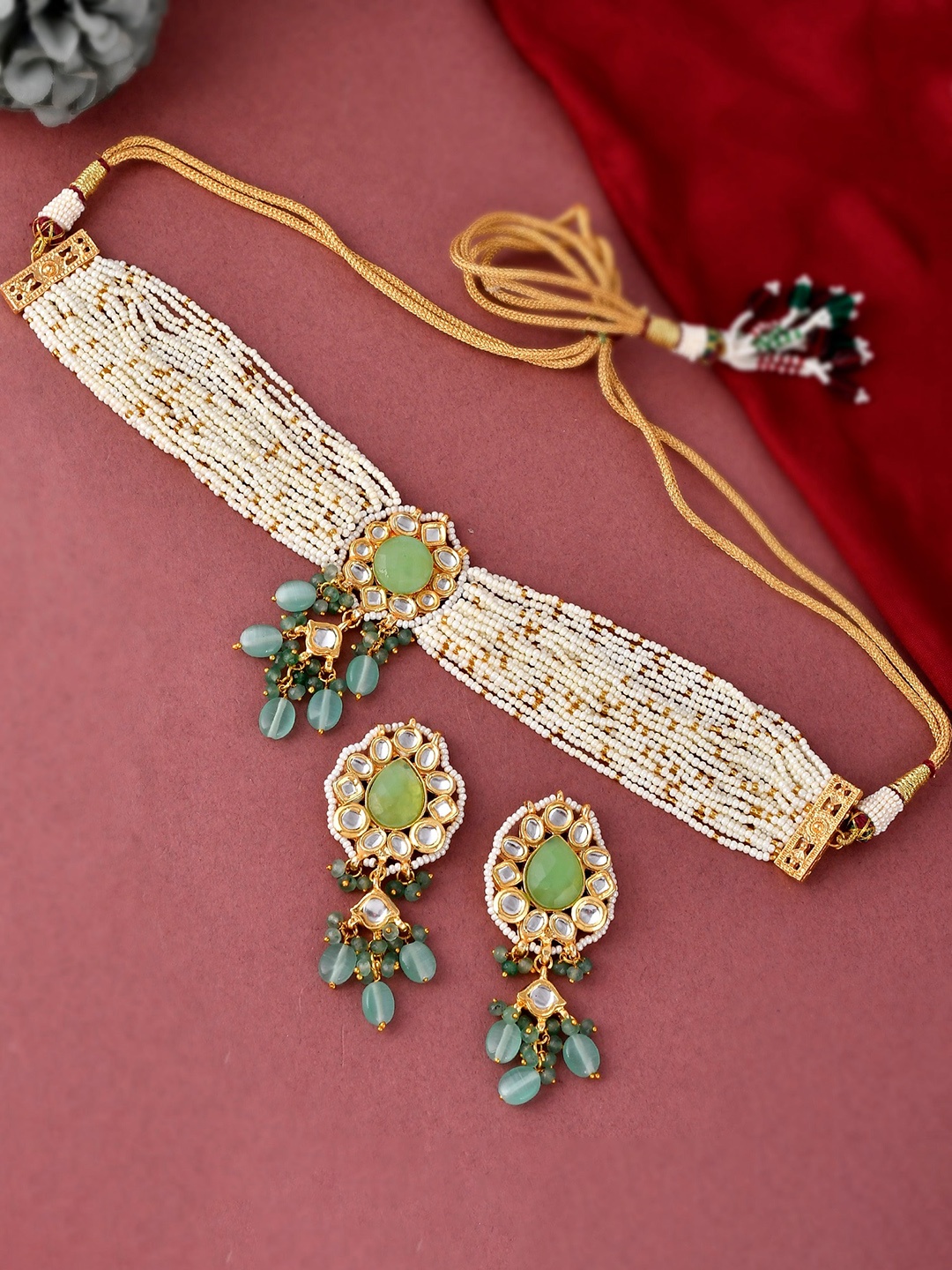 

DASTOOR Gold-Plated White & Green Kundan-Studded & Pearl Beaded Jewellery Set