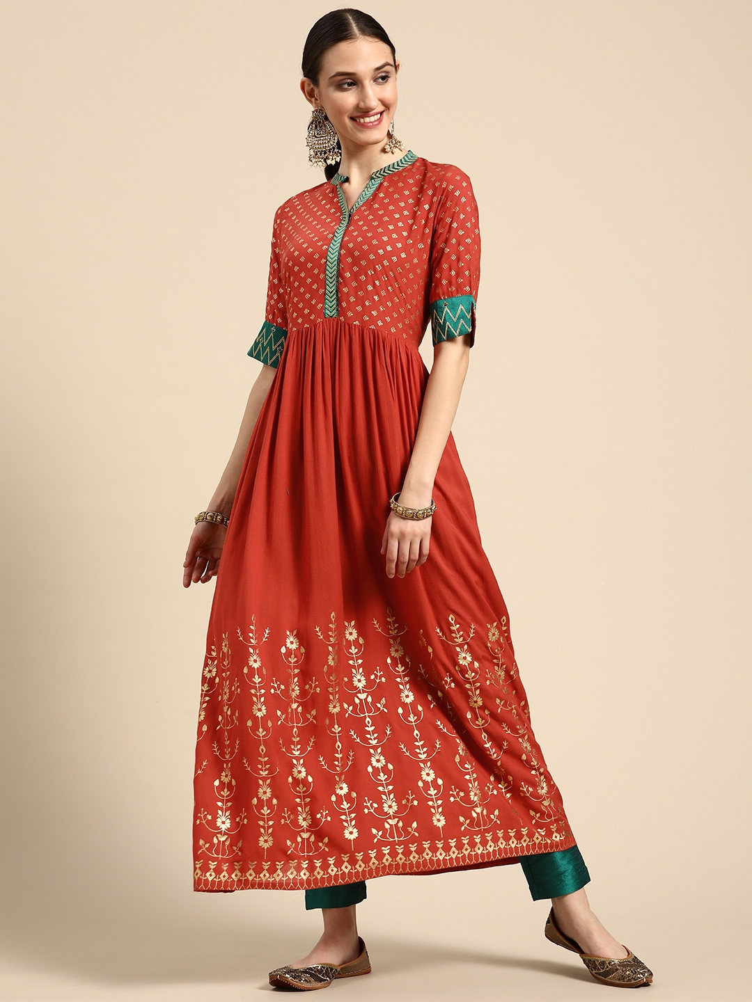 

Sangria Women Ethnic Motifs Printed Kurta with Trousers, Rust