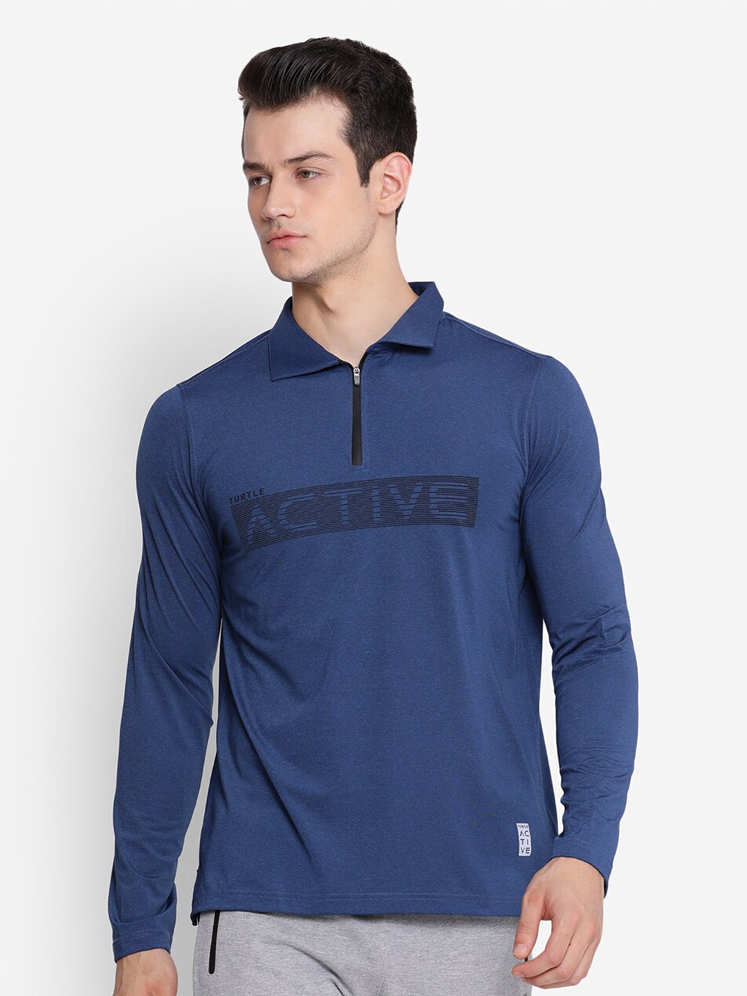 

Turtle Men Blue Typography Polo Collar Slim Fit T-shirt