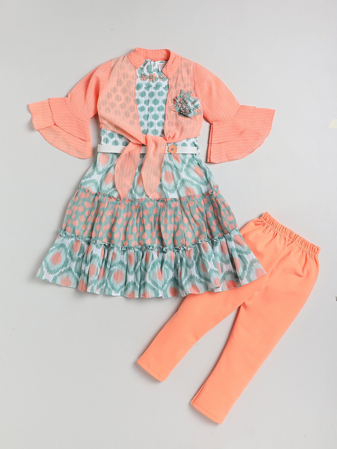 

Nottie Planet Girls Peach-Coloured & Green Printed Top with Legging comes with shrug