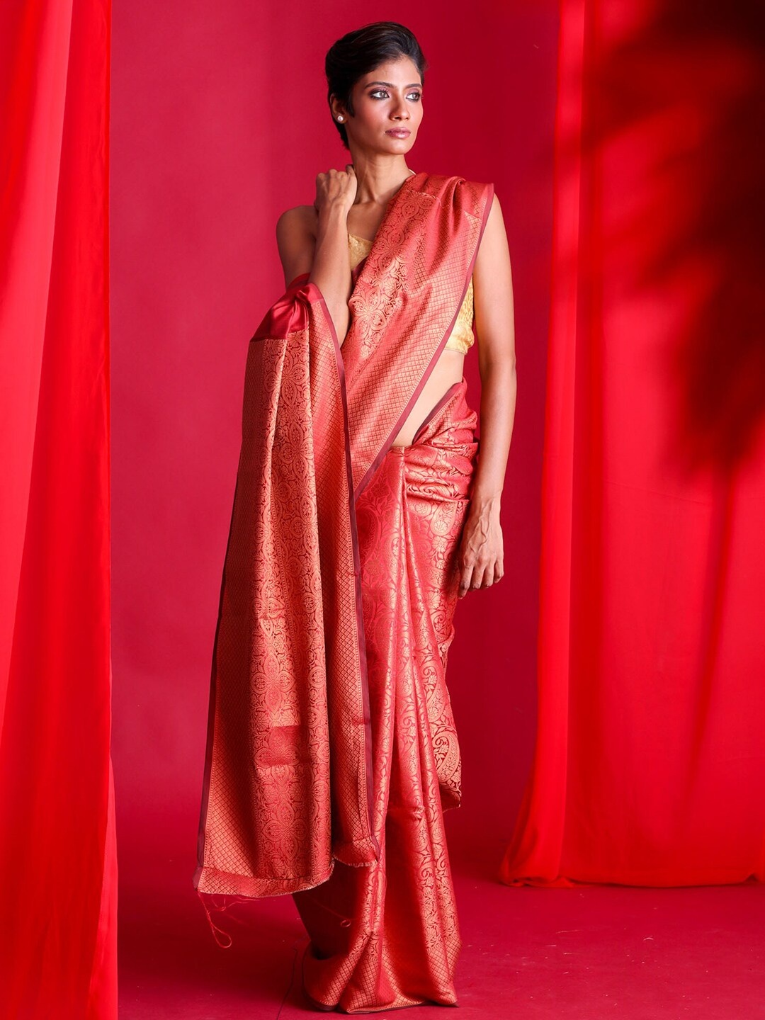 

BEATITUDE Red & Gold-Toned Ethnic Motifs Zari Banarasi Saree