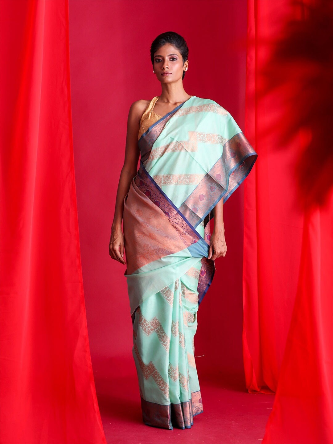 

BEATITUDE Green & Copper-Toned Ethnic Motifs Zari Silk Cotton Banarasi Saree