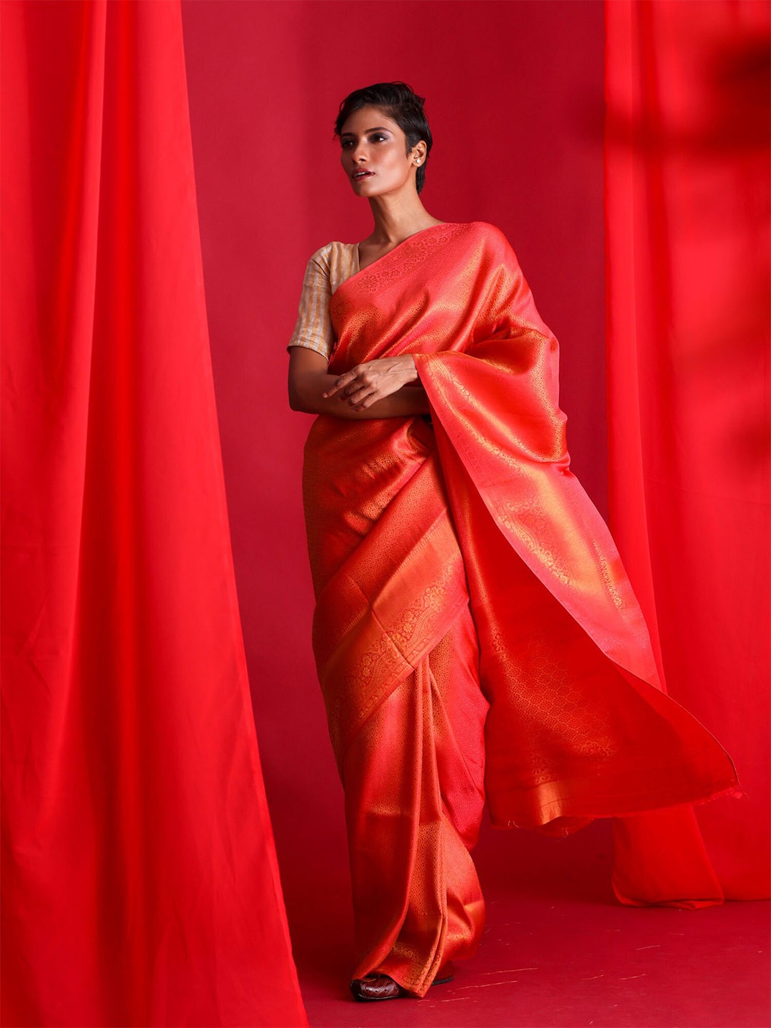 

BEATITUDE Orange & Gold-Toned Ethnic Motifs Zari Silk Blend Banarasi Saree
