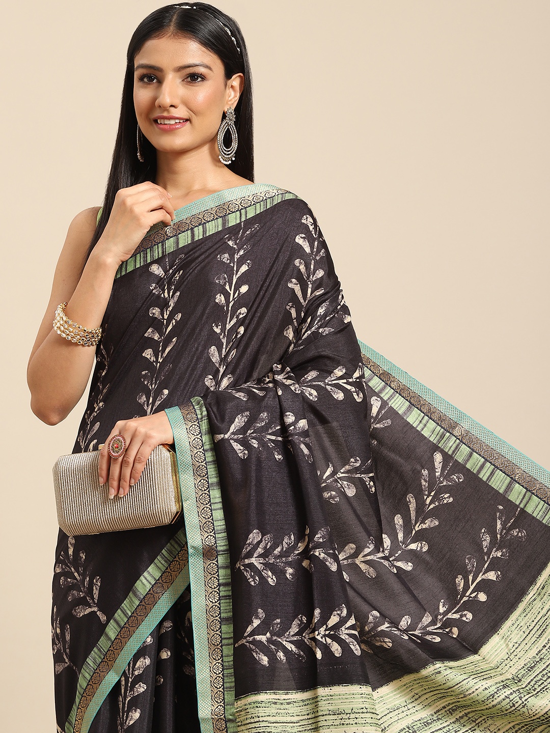 

Nimayaa Women Black & Green Printed Saree