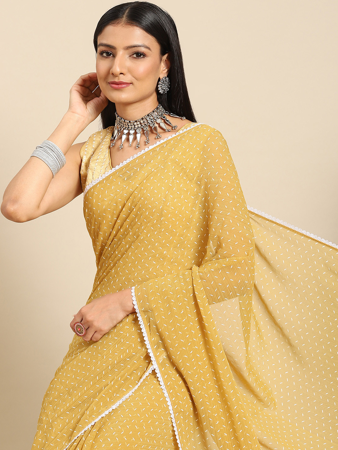 

Nimayaa Yellow & White Sequence Work Chiffon Saree