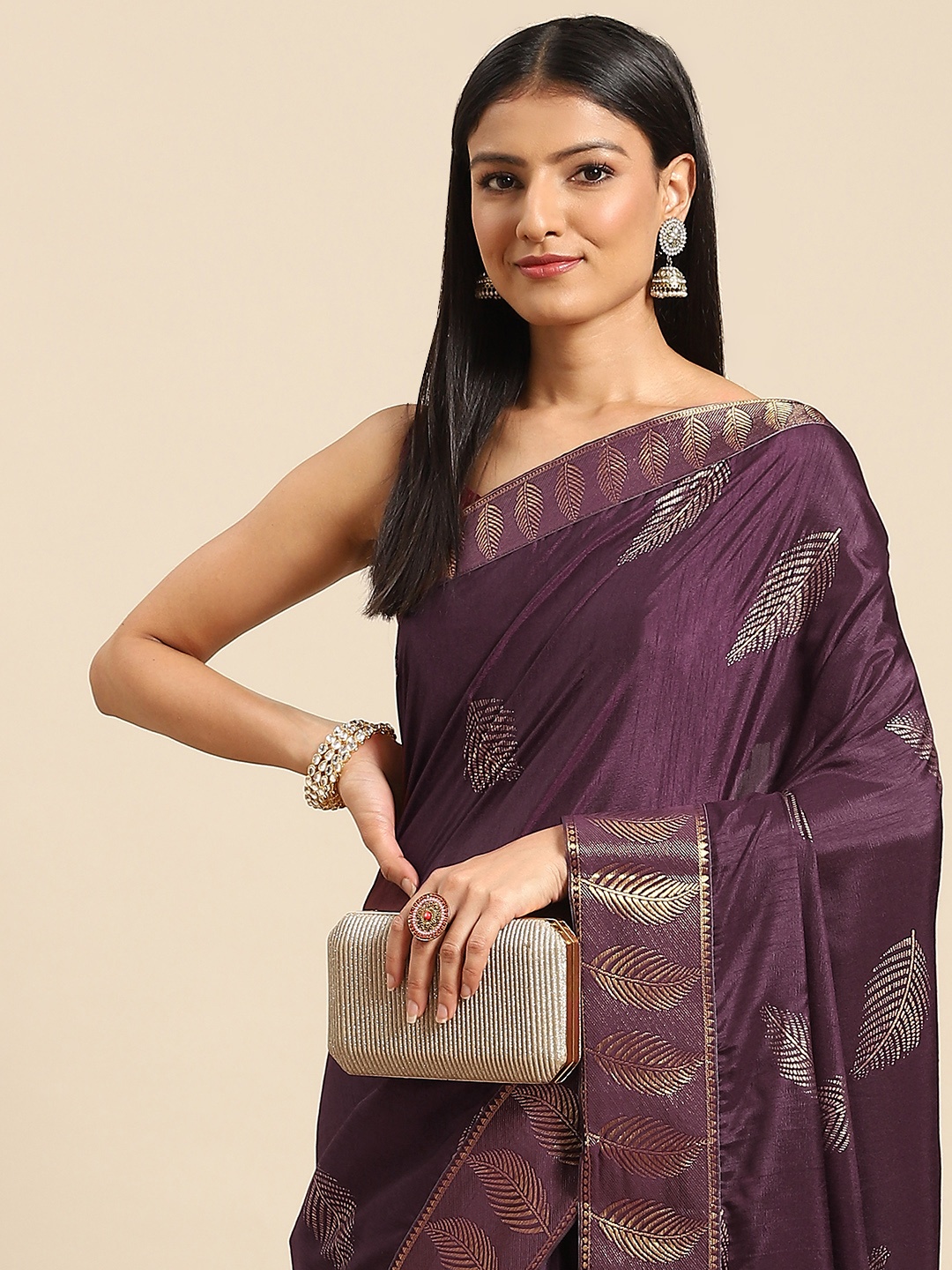 

Nimayaa Women Purple & Golden Woven Design Floral Saree