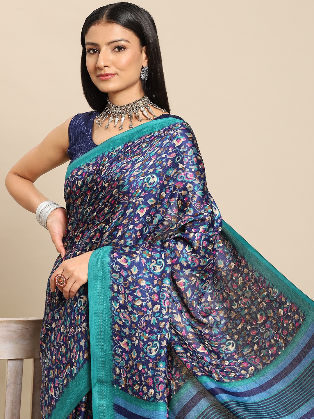 

Nimayaa Women Blue Ethnic Motifs Saree