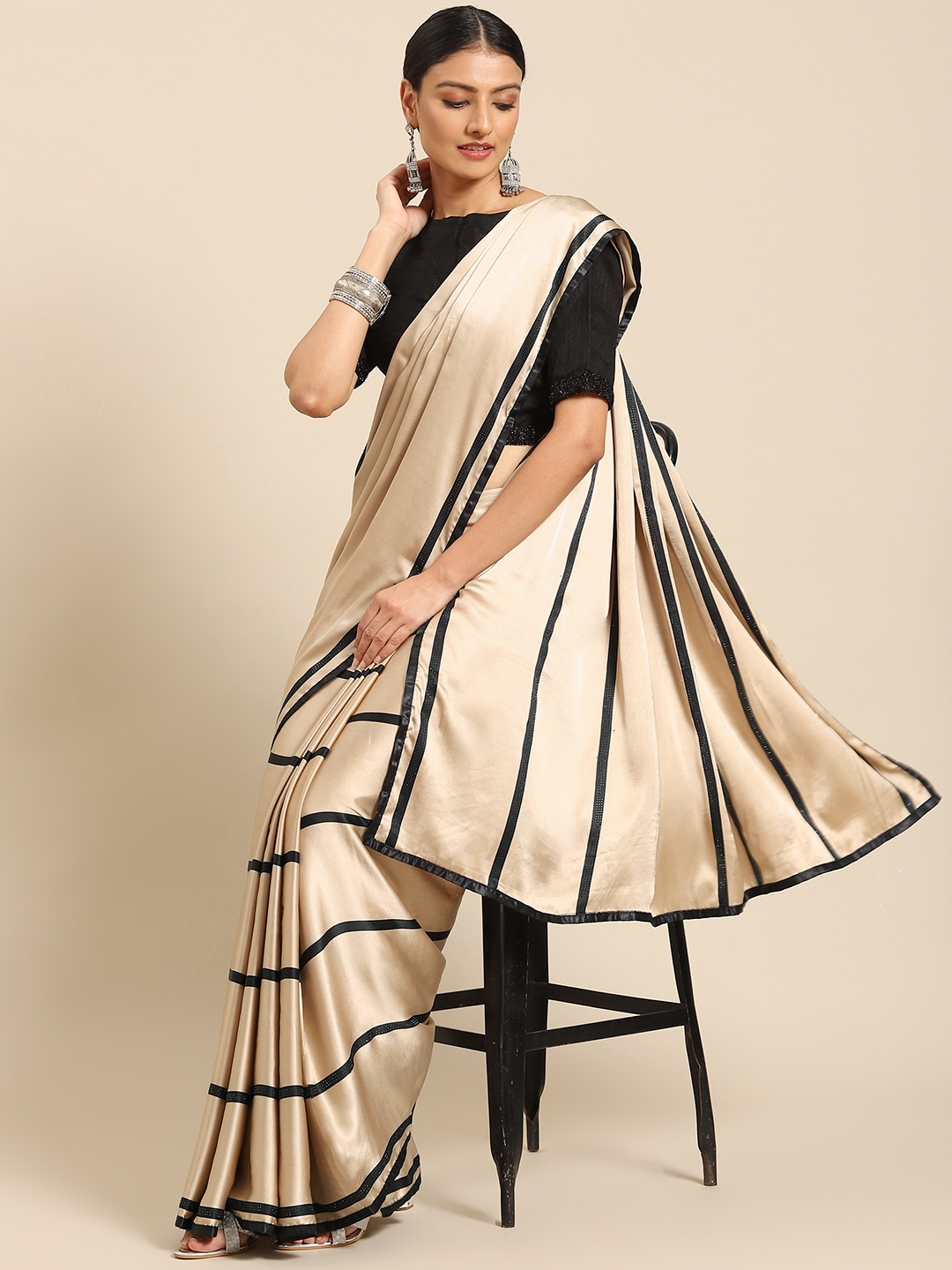 

Nimayaa Women Beige & Black Striped Satin Saree