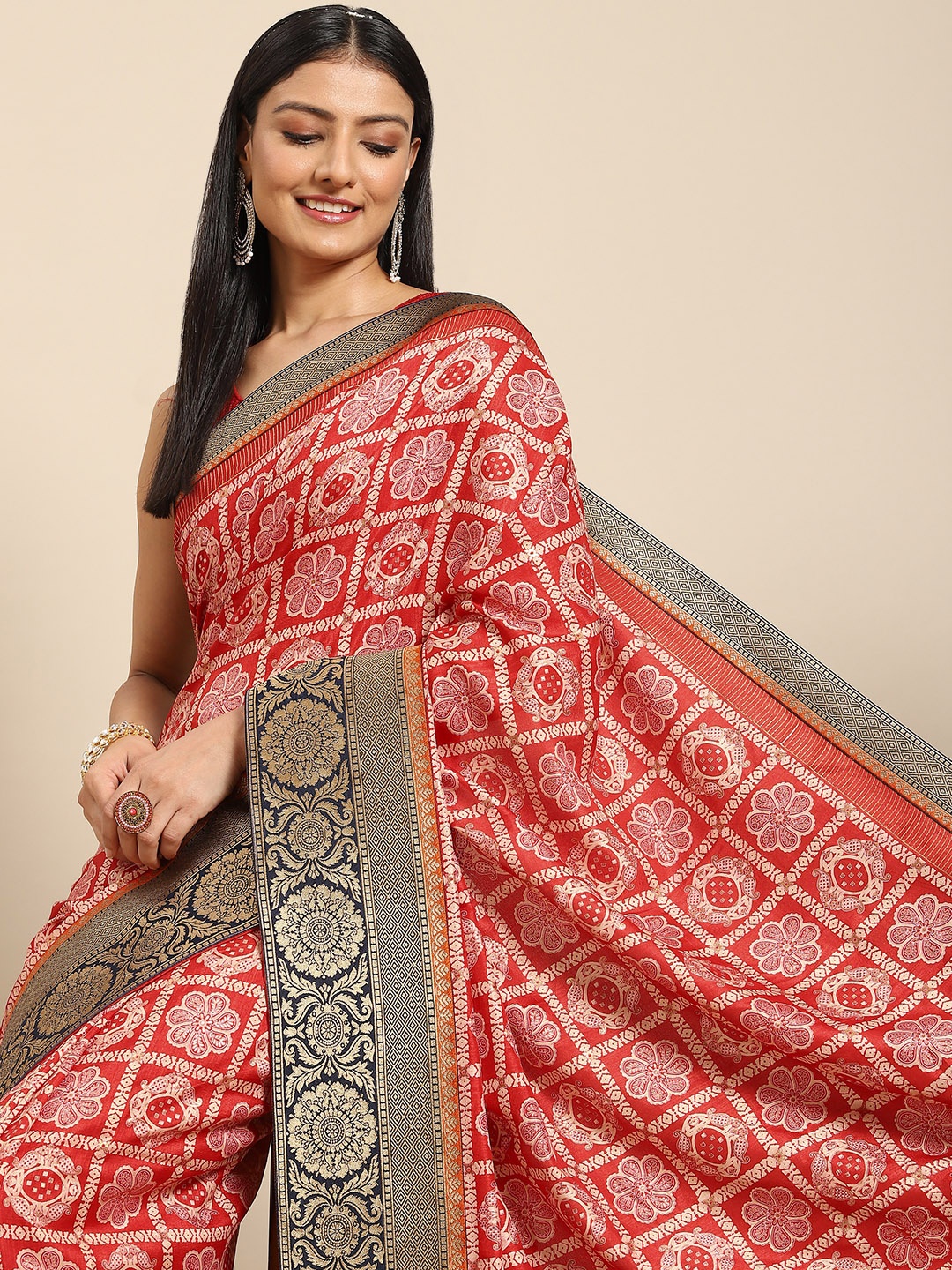 

Nimayaa Women Red & Golden Ethnic Motifs Saree