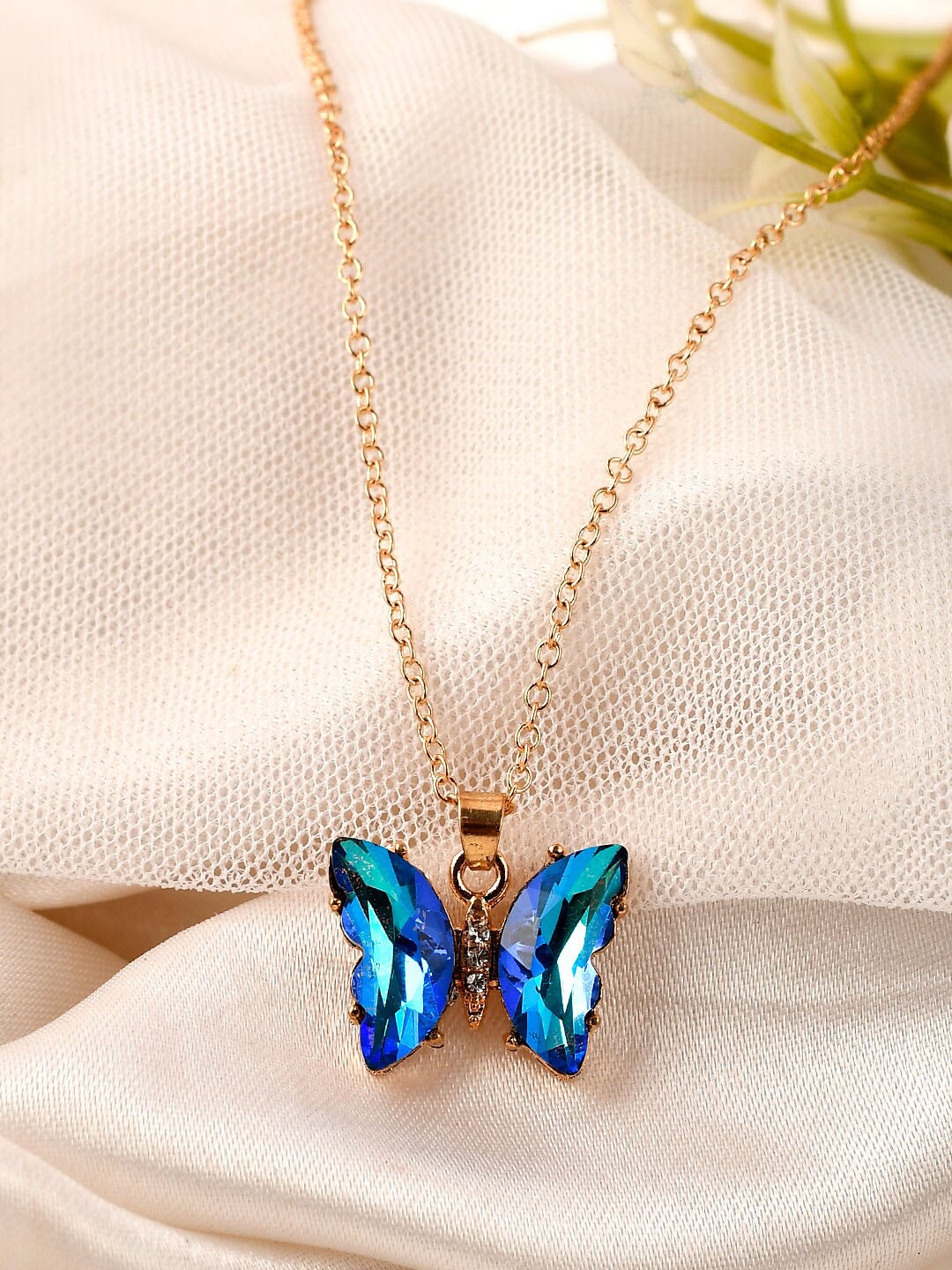 

AQUASTREET Women Gold-Plated Blue Stone-Studded Butterfly Pendant With Chain