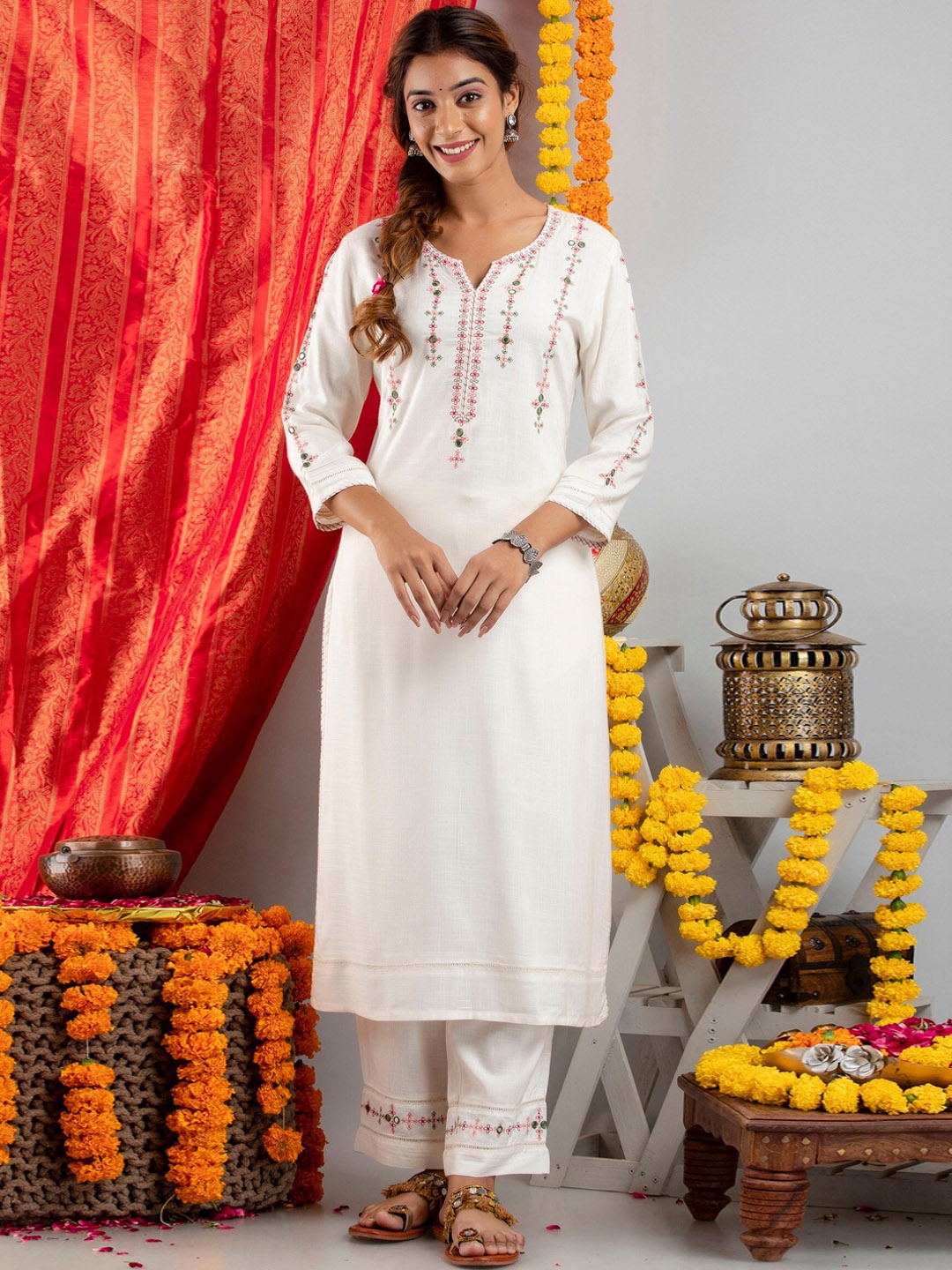 

SUTI Women Off White Embroidered Mirror Work Kurta with Trousers
