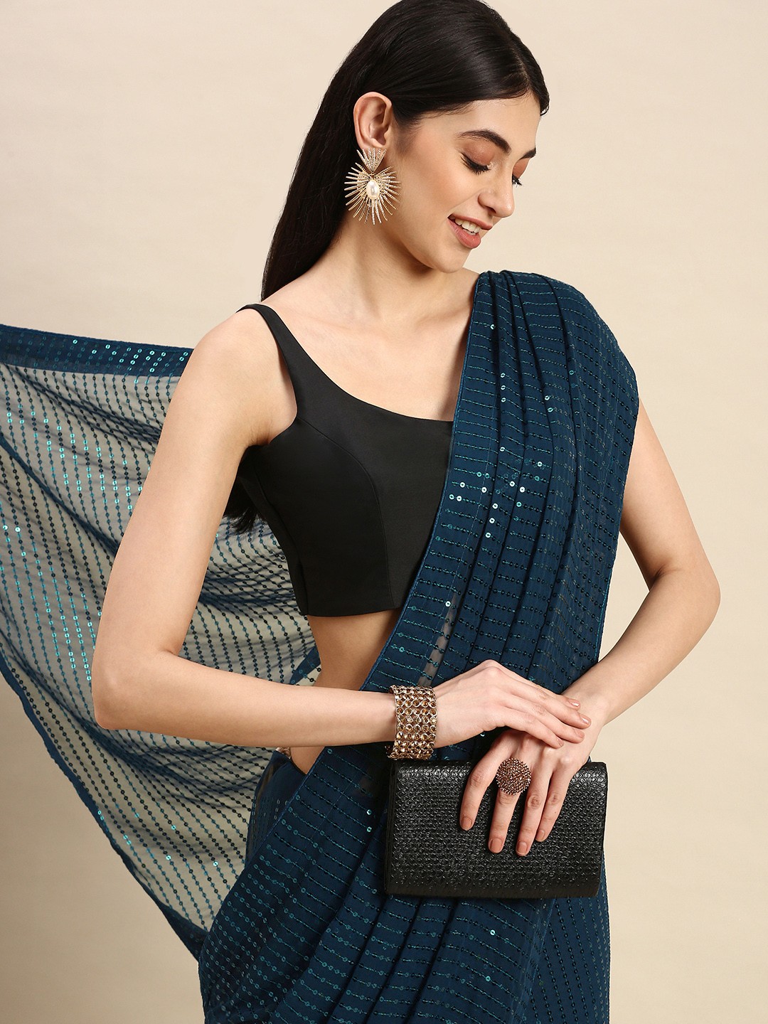 

nirja Fab Green & Silver-Toned Embellished Sequinned Saree
