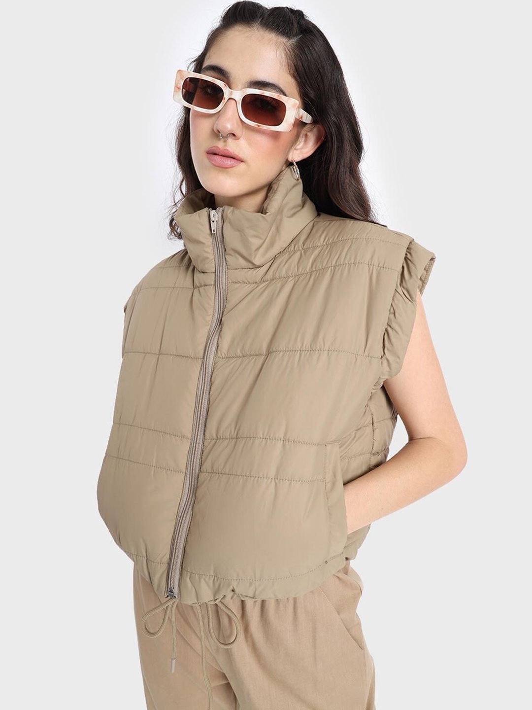 

Bewakoof Sleeveless Oversized Puffer Jacket, Beige