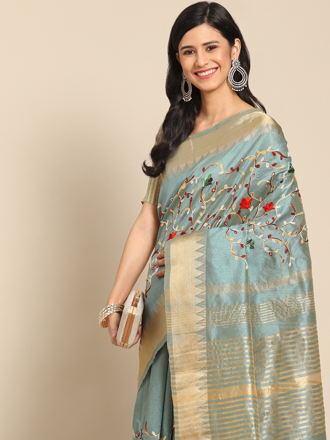 

RAJGRANTH Turquoise Blue Floral Embroidered Zari Saree