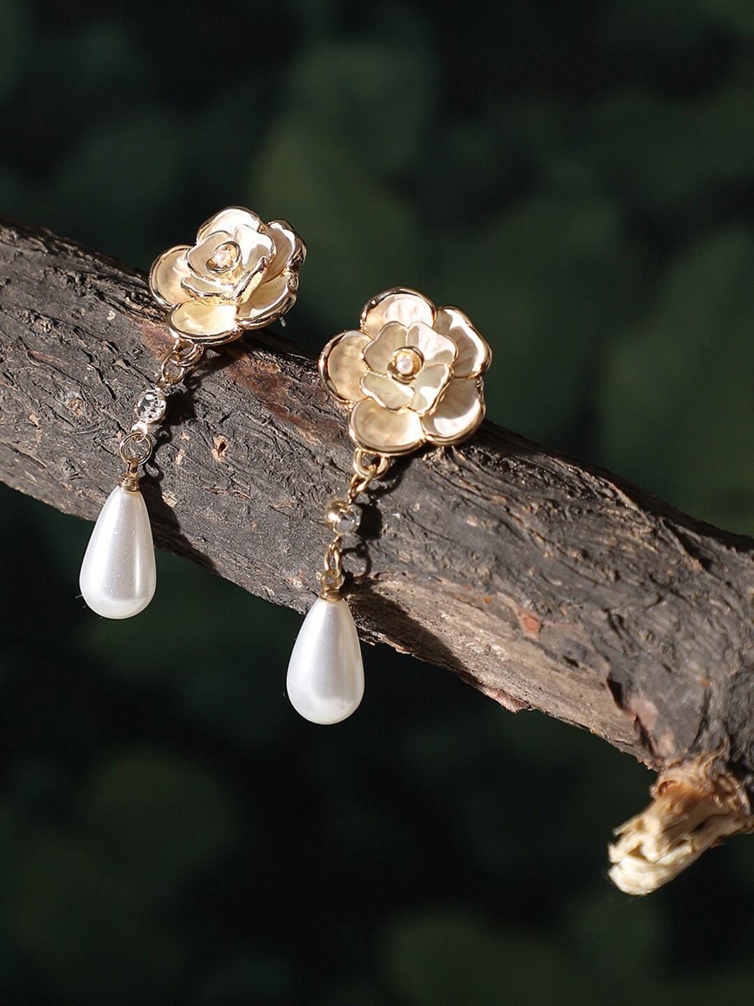 

SOHI Women Gold-Toned & White Contemporary Drop Earrings
