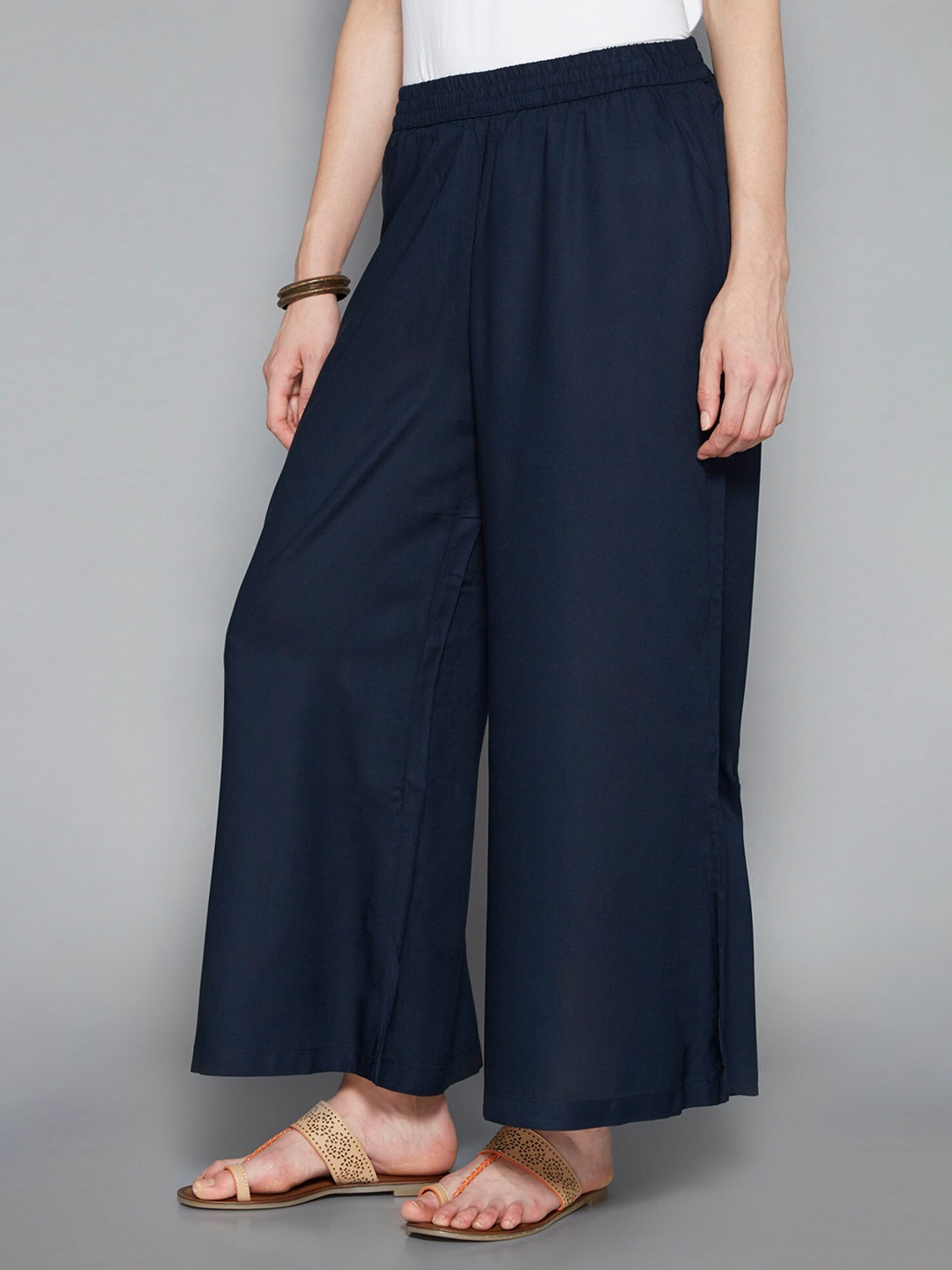 

Pistaa Women Navy Blue Flared Ethnic Palazzos
