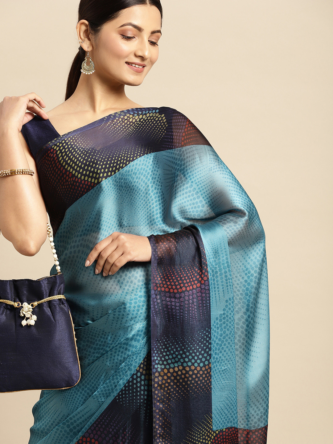 

RACHNA Blue Brasso Printed Saree