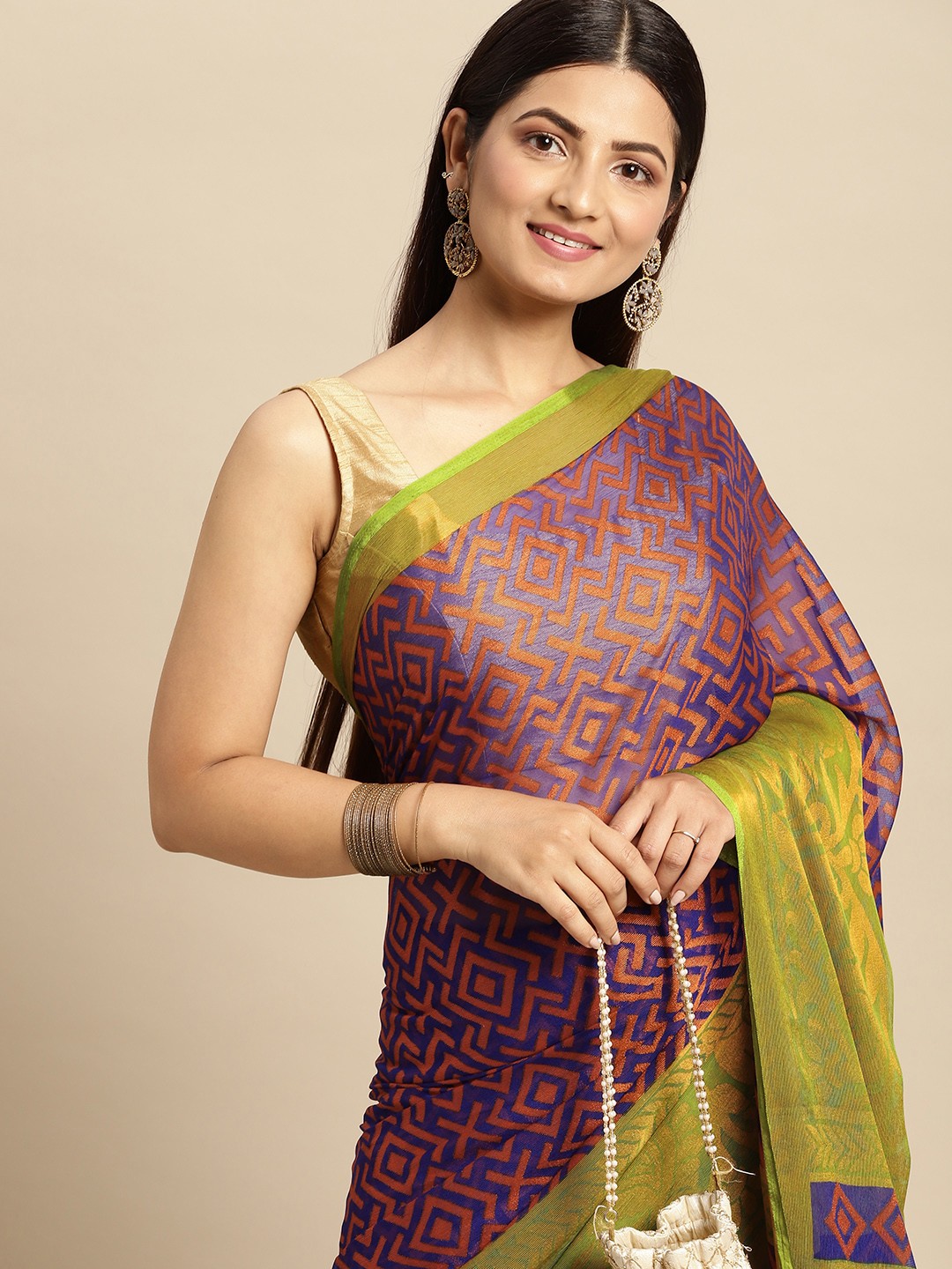 

RACHNA Navy Blue & Orange Printed Brasso Saree