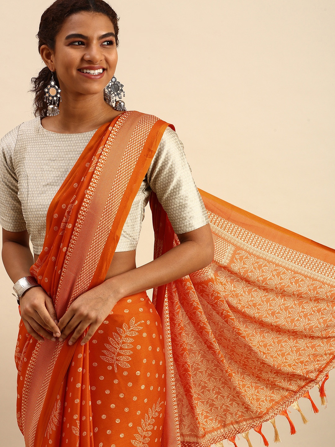 

RACHNA Orange & White Ethnic Motifs Brasso Saree