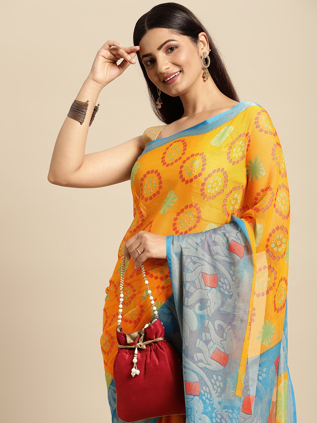 

RACHNA Yellow & Blue Ethnic Motifs Print Brasso Saree