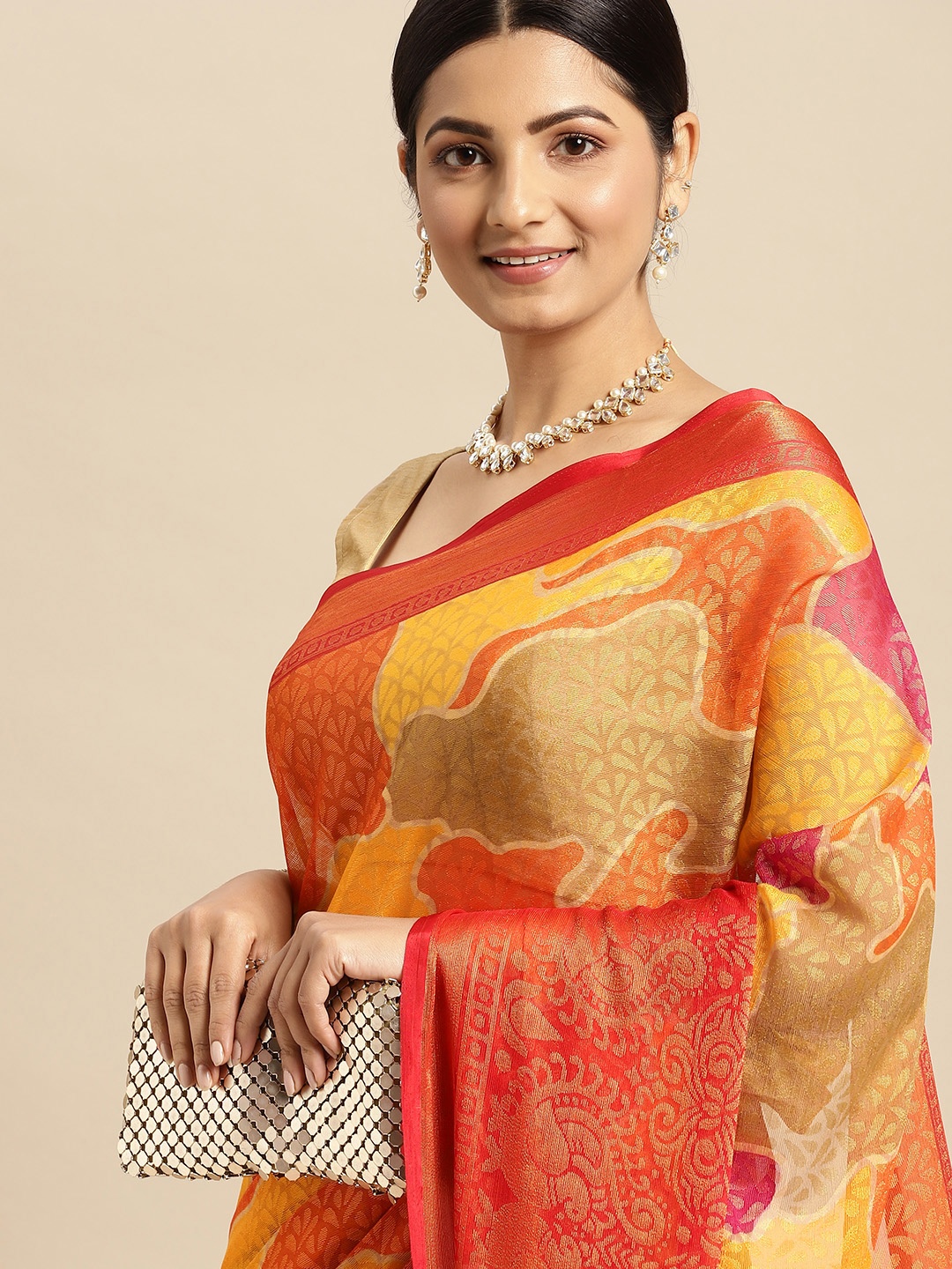 

RACHNA Orange & Yellow Printed Brasso Saree