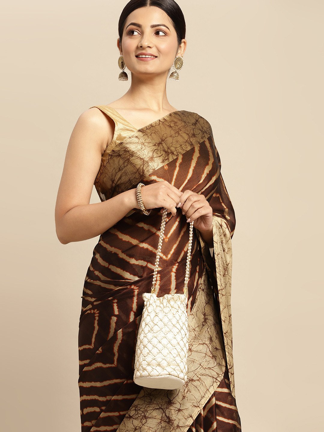

RACHNA Brown Brasso Printed Saree