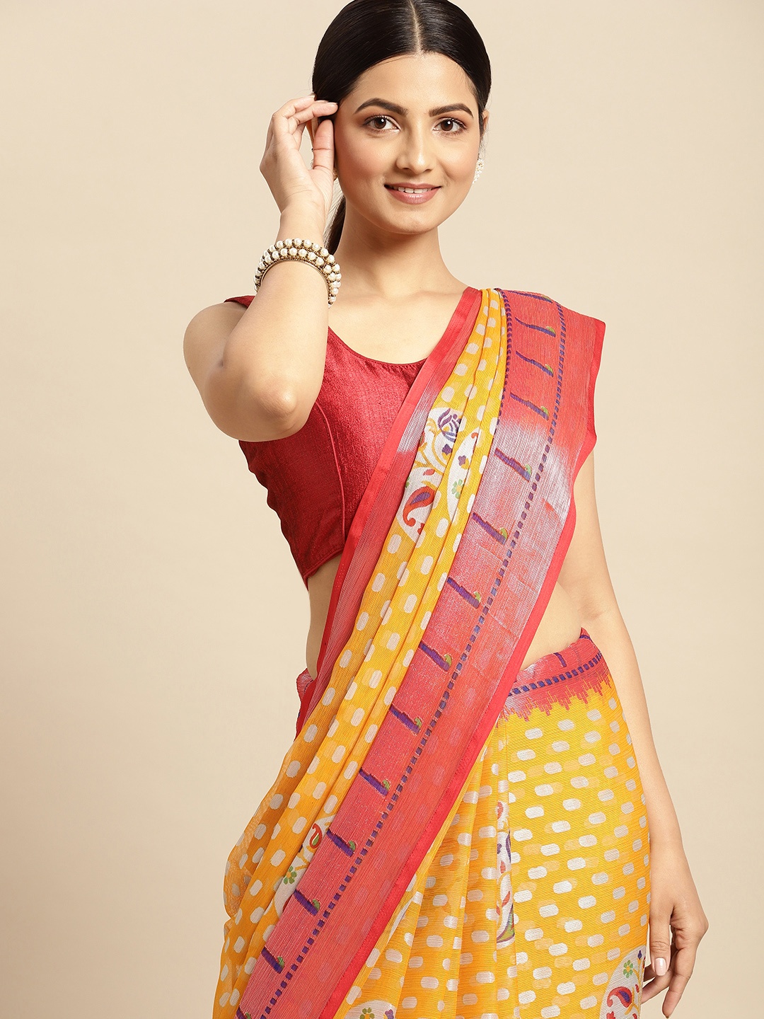 

RACHNA Yellow & Red Ethnic Motifs Brasso Saree