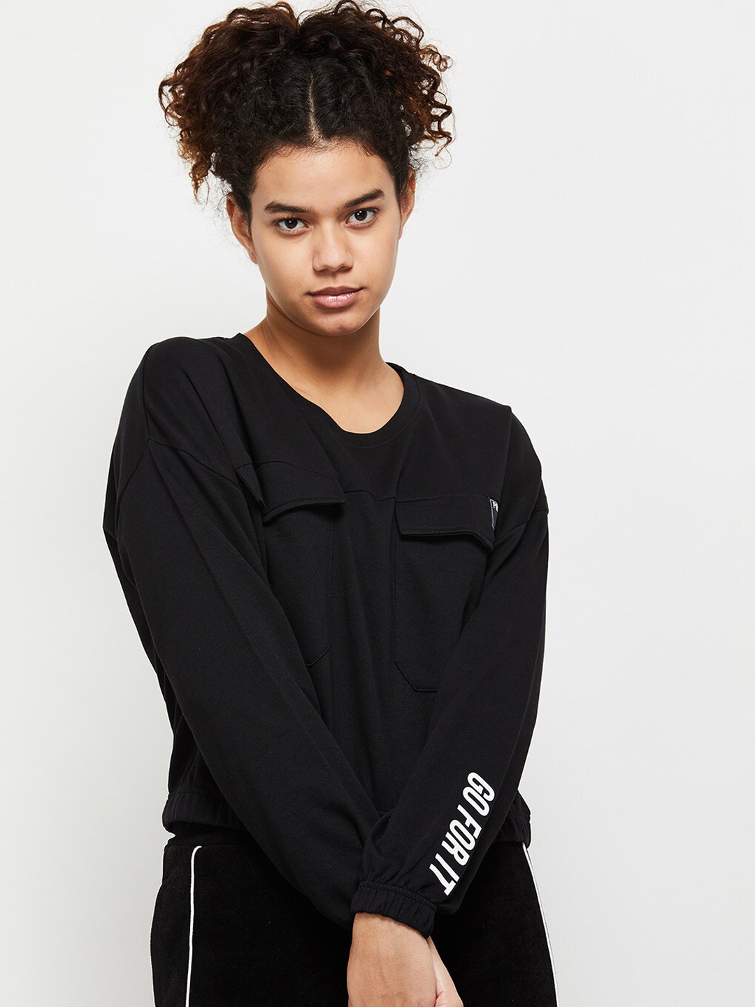 

max Women Black Solid Sweatshirt