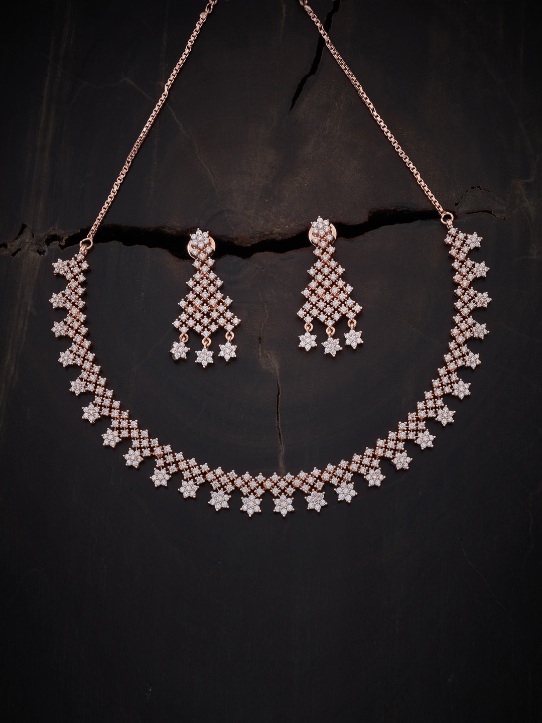 

Kushal's Fashion Jewellery Rose-Gold Plated White Kundan Studded Jewellery Set