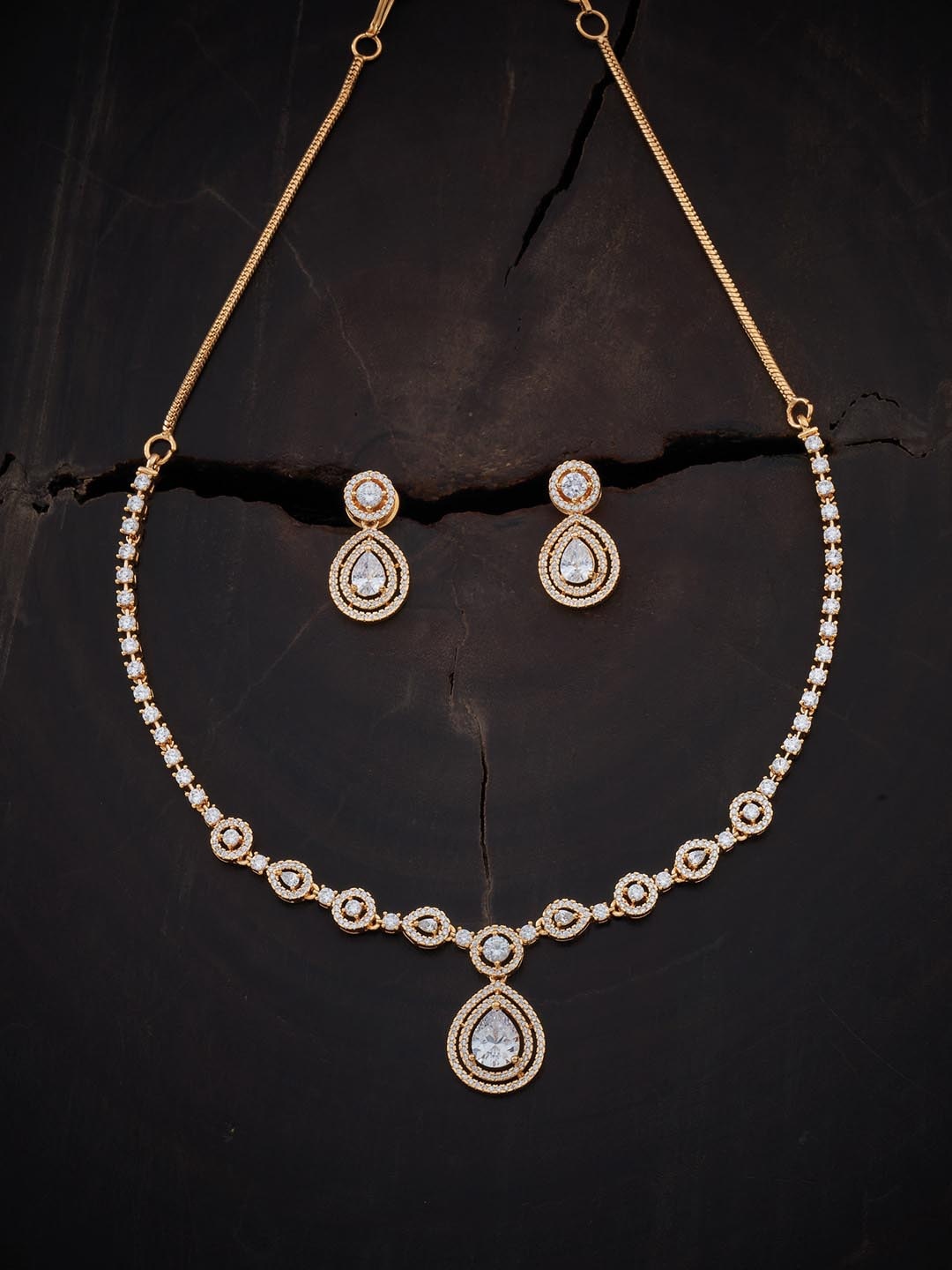 

Kushal's Fashion Jewellery Gold-Plated & White CZ Stone-Studded Jewellery Set
