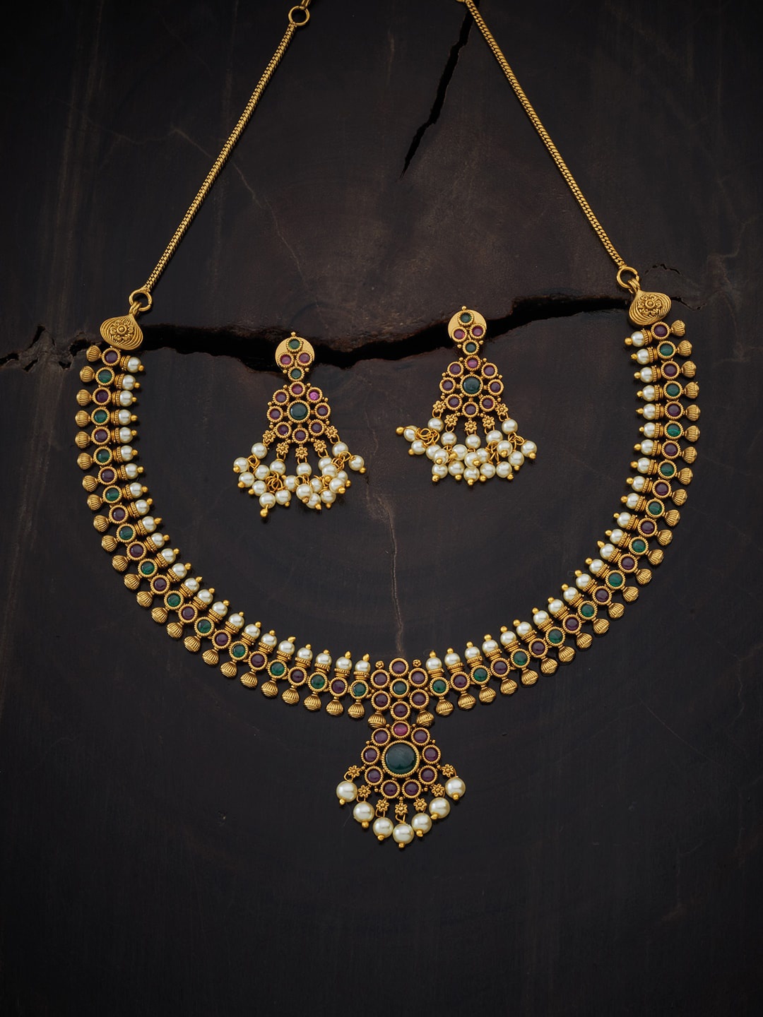 

Kushal's Fashion Jewellery Gold-Plated Gold-Toned Red Stone Studded Jewellery Set
