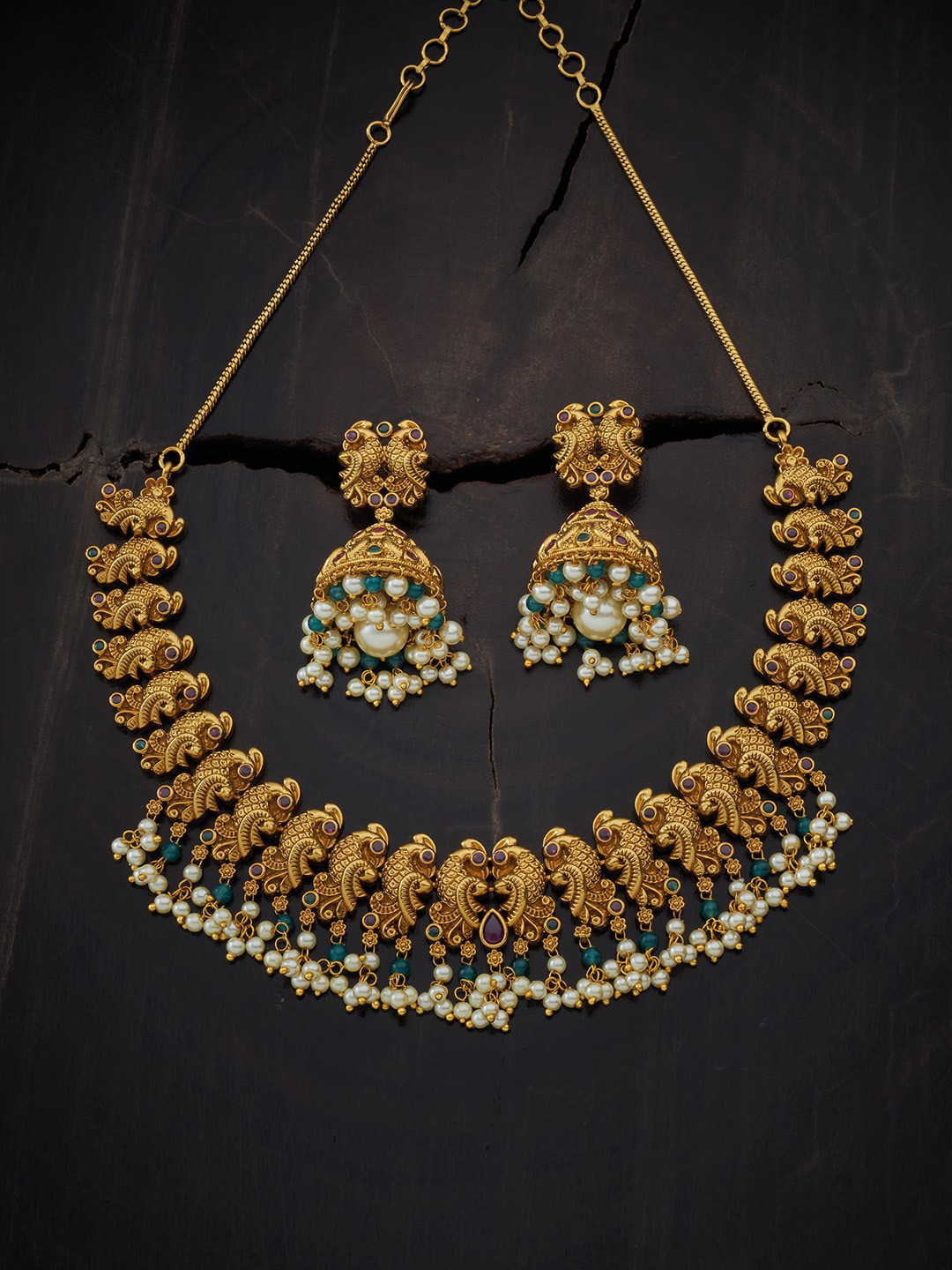 

Kushal's Fashion Jewellery Gold-Toned & Red Stone-Studded Jewellery Set