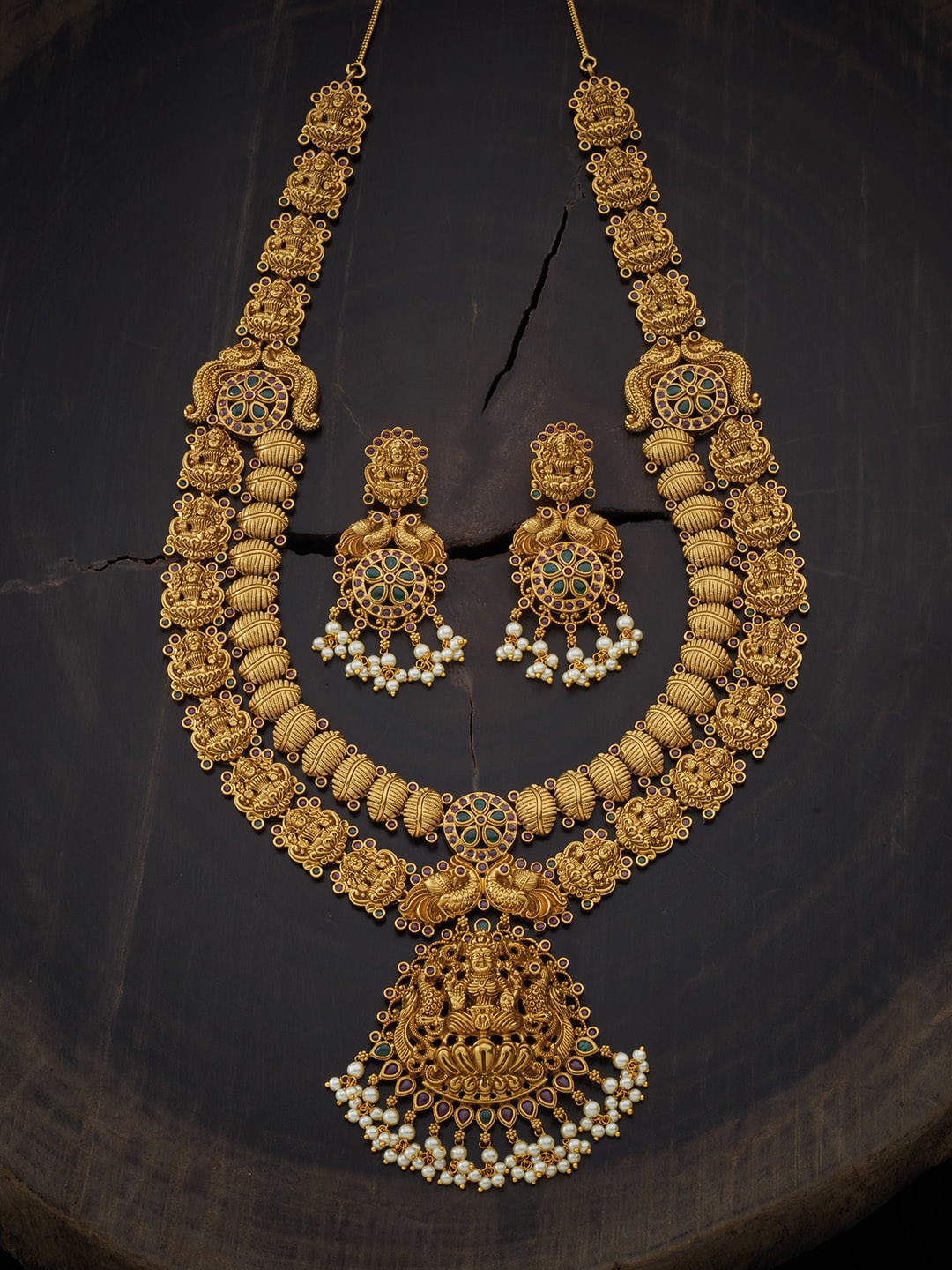 

Kushal's Fashion Jewellery Gold-Toned & Green Stone Studded & Beaded Antique Jewellery Set