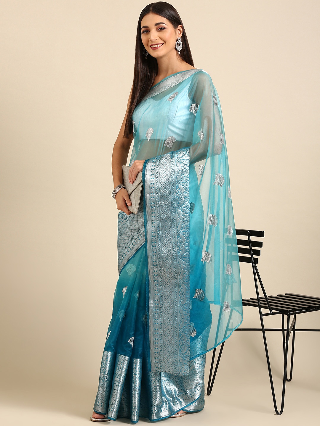 

Anouk Teal Woven Design Tissue Saree