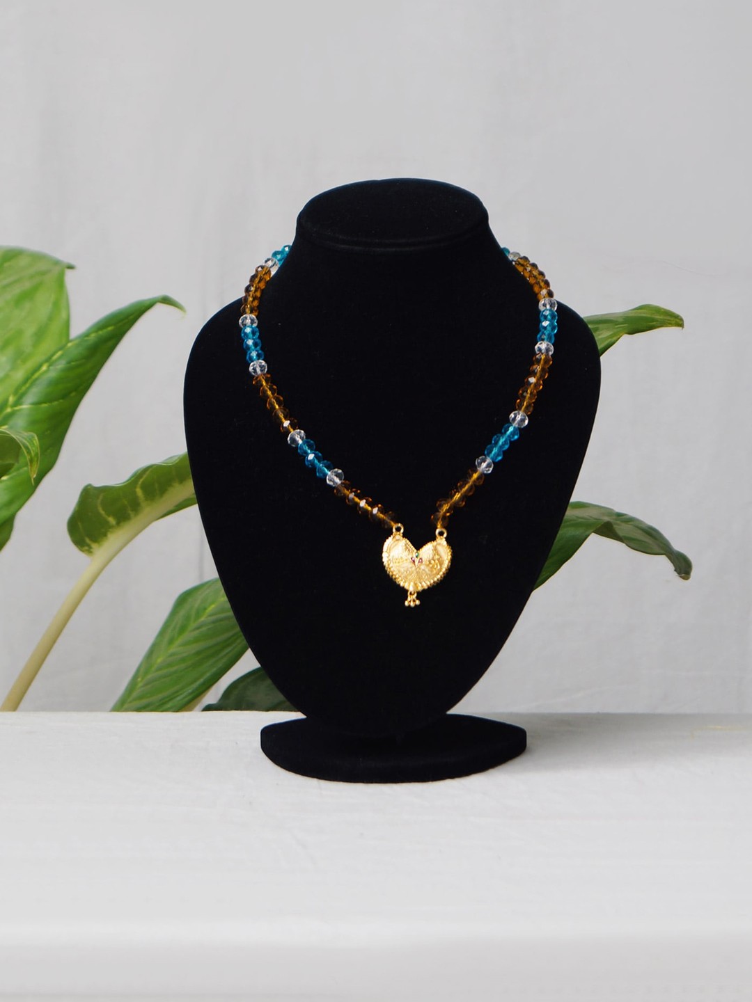 

Unnati Silks Women Yellow & Blue Necklace