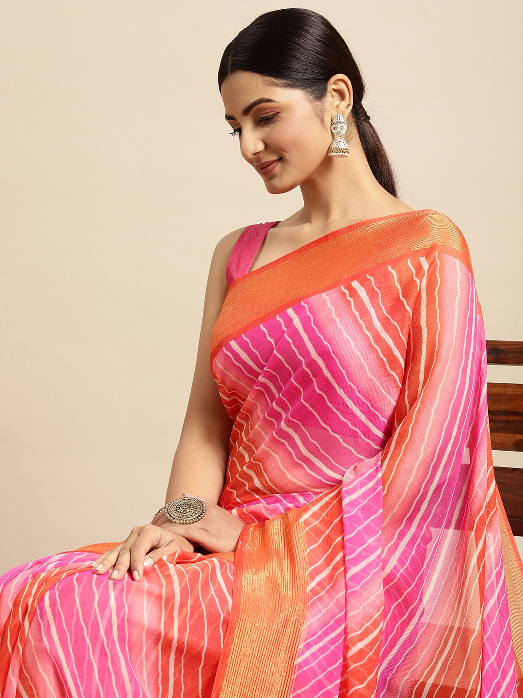 

RACHNA Pink & Orange Poly Chiffon Striped Saree