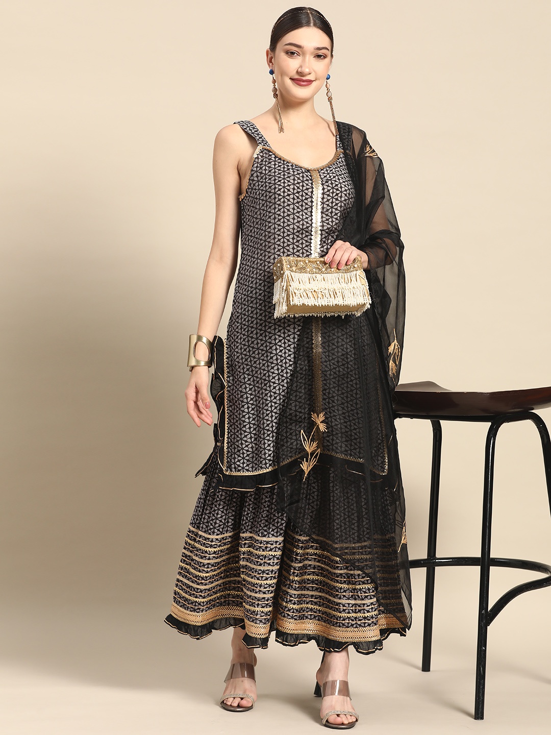 

Sangria Women Black Ethnic Motifs Printed Gotta Patti Chanderi Silk Kurta with Sharara & With Dupatta