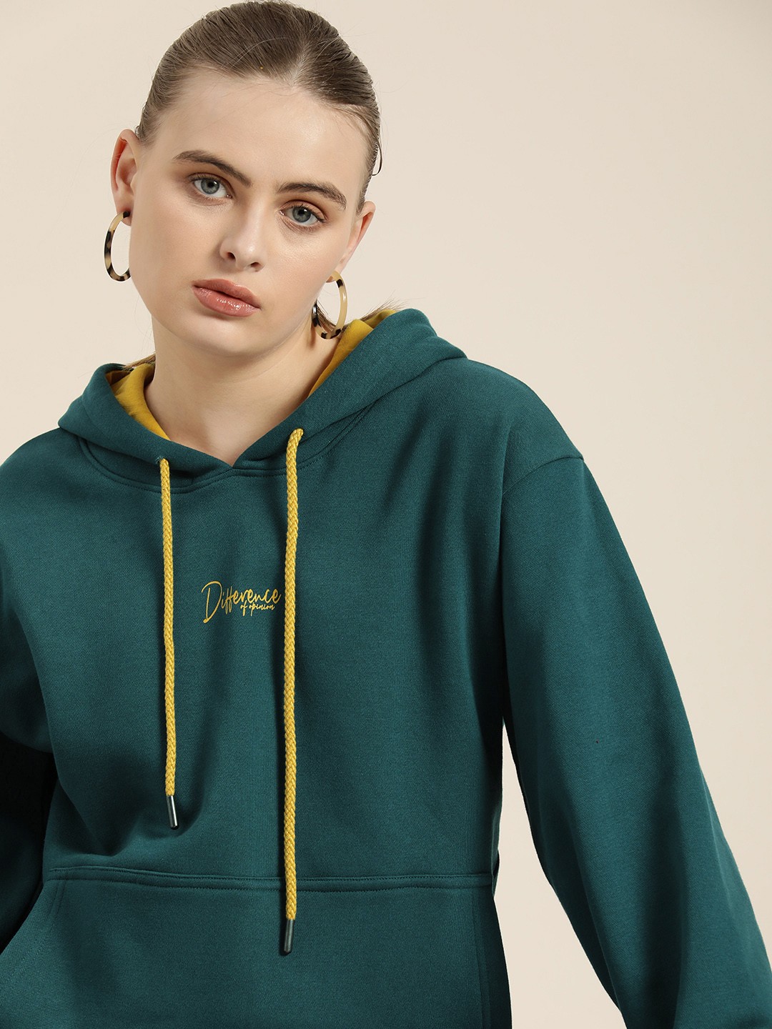 

Difference of Opinion Women Green Solid Oversized Drop Sleeves Hooded Sweatshirt