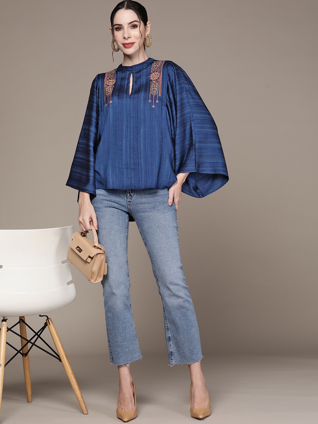 

aarke Ritu Kumar Blue Embroidered Kaftan Top