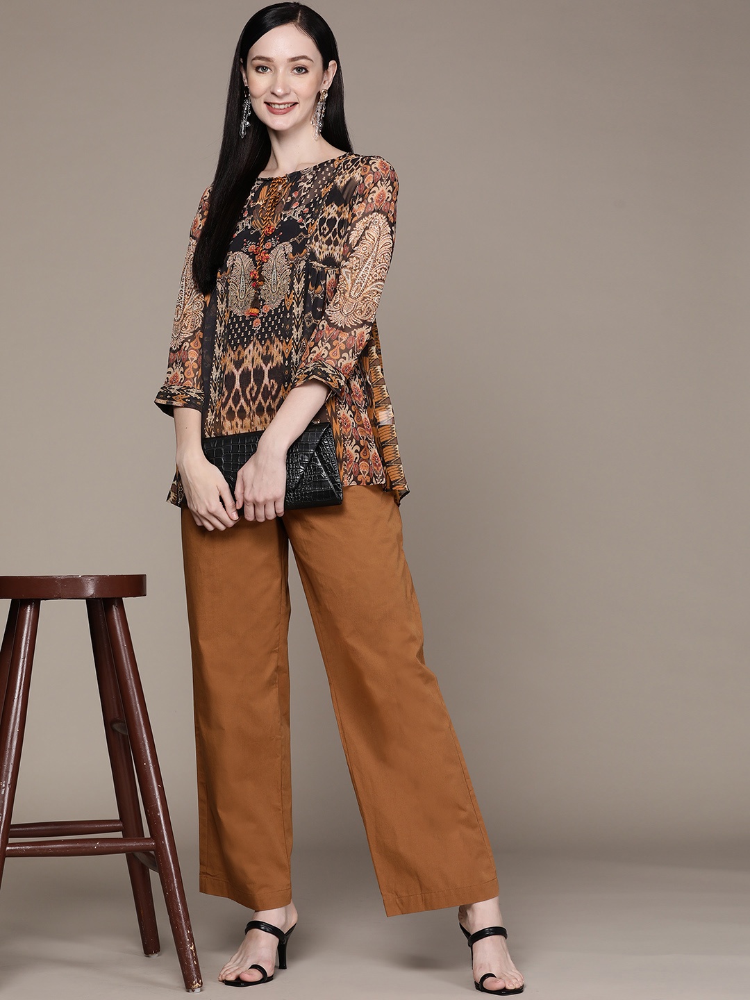 

aarke Ritu Kumar Black & Beige Tribal Print Tie-Up Neck Georgette Top
