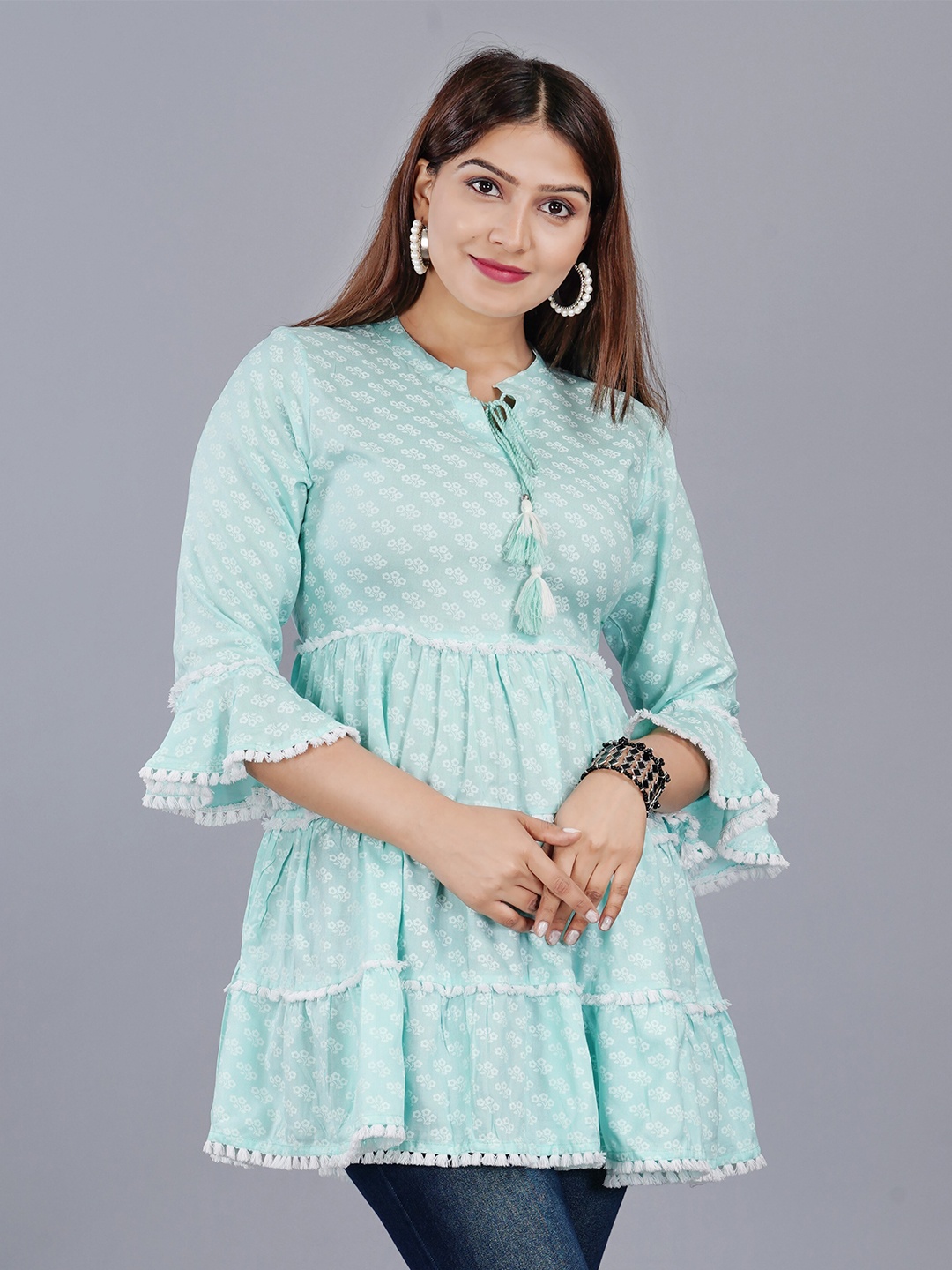 

HIGHLIGHT FASHION EXPORT Blue Floral Print Tie-Up Neck Top