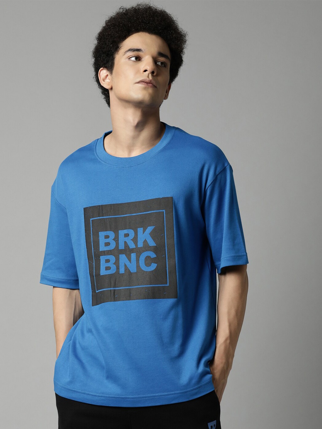 

Breakbounce Men Blue & Black Typography Printed Pure Cotton T-shirt