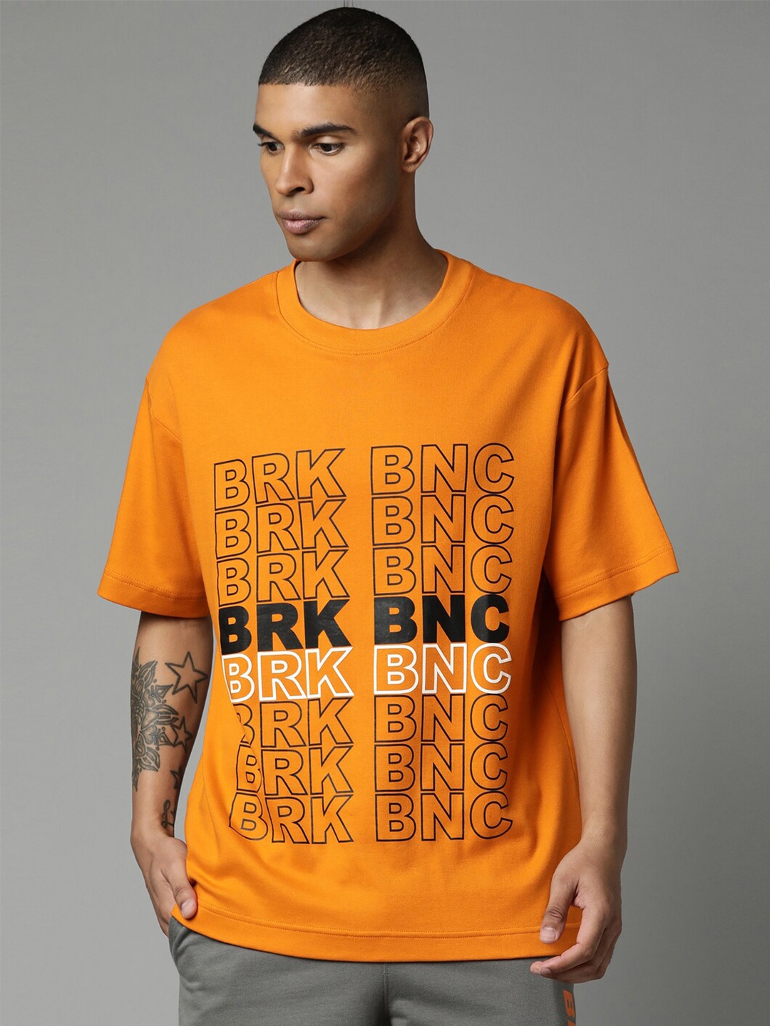 

Breakbounce Men Orange Typography Printed Pure Cotton T-shirt