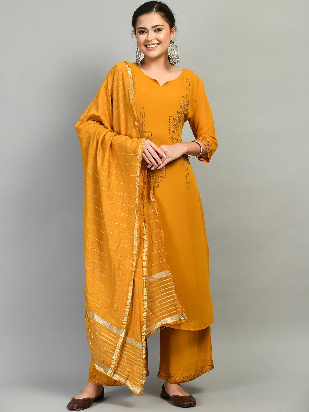 

DesiNoor com Women Mustard Yellow Floral Embellished Beads and Stones Kurta Set