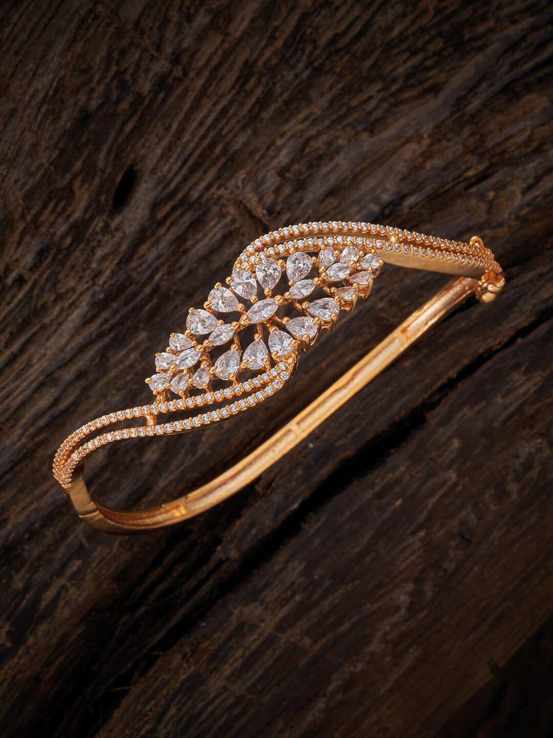 

Kushal's Fashion Jewellery Women Gold-Toned & White Cubic Zirconia Gold-Plated Kada Bracelet