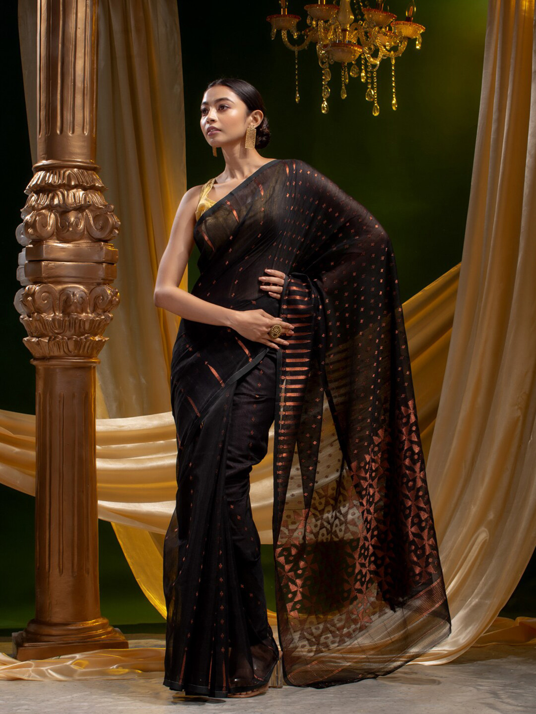 

Mitera Black & Gold-Toned Ethnic Motifs Zari Silk Cotton Heavy Work Saree